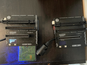 2x sanni cartreader v3 on a shelf